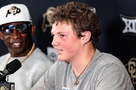 Colorado teen who beat cancer signs with Deion Sanders' Buffs