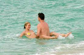 Cameron Diaz and her boyfriend are getting horny while swimming naked in  the beach water - Celebrity nude