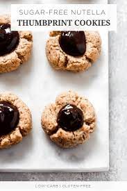 These almond flour cookies are the perfect low carb cookie you never knew you needed in your life and they only take 5 ingredients to make! Made These Sugar Free Nutella Thumbprint Cookies With Almond Flour And My Easy Peasy Homemade Nutella D Sugar Free Nutella Low Calorie Cookies Coconut Recipes
