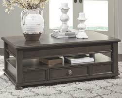 Devensted Coffee Table With Lift Top Ashley Furniture Homestore In 2020 Coffee Table Living Room Leather Lift Top Coffee Table
