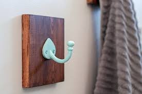 There are plenty of robe hooks available that would look perfect in your modern, minimalist bathroom as well as more traditional styles made out of wood or traditional finishes. Easy Simple Diy Bathroom Towel Hooks Using Scrap Wood Anika S Diy Life