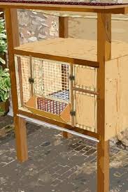 Faire Une Mangeoire Ratelier Pour Les Lapins Plan Poulailler Bio Abreuvoir Automatique Lapin Abreuvoir
