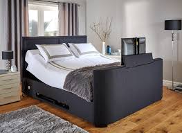 The headboard and footboard are both rounded and curved to give a more contemporary look. Truscott Midnight Blue Fabric Tv Bed Frame 5 0 King Bed Sava