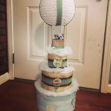 Hot Air Balloon Diaper Cake On Top Of A Hatbox Bstarz Hot Air Balloon Diaper Cake Diaper Cake Balloons