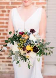 Since greenery and foliage come in so many beautiful shades and interesting shapes, your florist can create texture by combining different leaves and foliage in various green shades. Edgy Black And White Art Gallery Wedding Art Gallery Wedding Modern Bouquet Fall Foliage Wedding