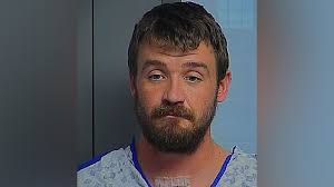 Man arrested after woman found bleeding