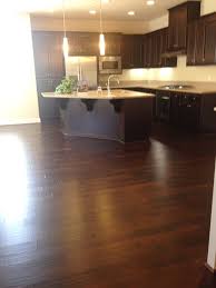 The quality of these dark wood kitchen floors is highly regulated by ensuring that all recommended standards in terms of measurements are strictly followed. Dark Wood Floor With Dark Cabinets