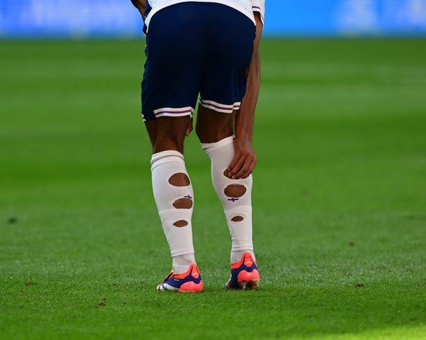Clever reason why England players cut holes in their socks - as fans are  baffled - The Mirror
