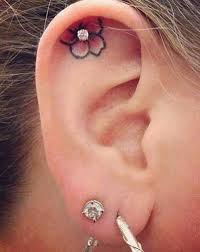 23 Tiny Ear Tattoos That Are Better Than Piercings Tattoos Earring Tattoo Ear Tattoo