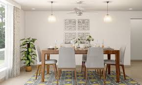 The shabby chic fixture elevates the space without leaving a fussy impression. Dining Room Lighting Ideas For Your Home Design Cafe