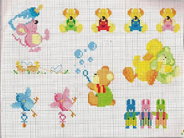 Punto croce vuoi decorare un tessuto e non hai idee su come poterlo fare? Bavaglini Punto Croce Schemi E Disegni Da Ricamare
