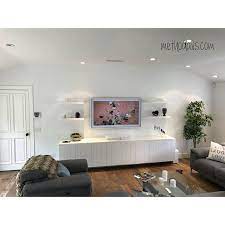 The Frame Tv From Samsung And Sonos Playbase The Perfect Pair Custom Audio Video Installation From Method Avs Beams Living Room Living Room Framed Tv