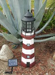 Our lighthouse replicas are handcrafted in the usa by amish woodworkers. Solar Powered Lighthouse Lawn Ornaments Outsidemodern