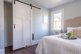 sliding barn door in spa like master retreat benjamin moore pale smoke paint on walls interior barn doors barn doors sliding home