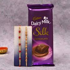 Maybe you would like to learn more about one of these? Set Of 2 Beads Pearl Rakhi With Dairy Milk Chocolate Gift Send Rakhi Gifts Online L11115590 Igp Com