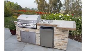 Opposite side we match the veneer stone and concrete cap on a newly outdoor an entertainers oasis, with double height ceilings, integrated kitchen, sink and backlit bar fridges. Outdoor Refrigerator Bull Outdoor Products