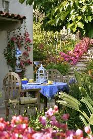 Eclectic Outdoor Dining Area By Better Decorating Bible Diy Enchanting Backyards And Whimsical Spaces Backyardlandsc Beautiful Gardens Garden Design Outdoor