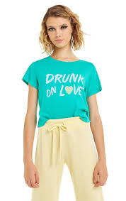 The song is sing by: Wildfox Drunk On Love Baby Tee Shirt Bliss Bandits