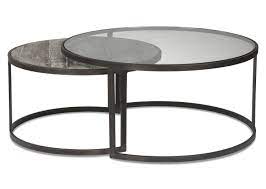 Ash solids and quartered white oak veneersinset round mirrored glass in center with stainless steel gallery. Madera Nesting Coffee Table Rnd Oak Bay