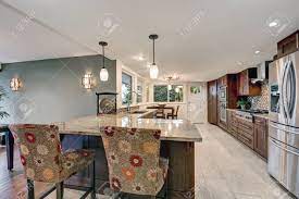From humble beginnings, working out of a small commercial kitchen, we now supply a range of customers across australia from our purpose built facility located on the beautiful sunshine coast in queensland. Beautiful Modernized Epicurean Kitchen With Natural Brown Cabinets Stock Photo Picture And Royalty Free Image Image 89877151