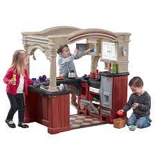 This stylish play kitchen will have your children creating their own culinary masterpieces! Grand Walk In Kitchen Kids Play Kitchen Step2