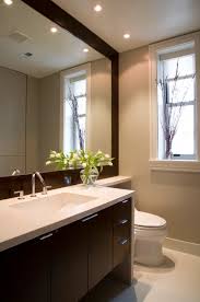 Alternatively you can get a tile design with pieces of mirror in small square shapes that will create a large piece. A Toilet Can Help A Small Bathroom Appear Bigger Yep Learn How Designed Modern Bathroom Design Bathroom Design Modern Bathroom