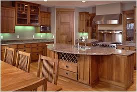 kitchen cabinetry, chairs and table