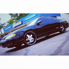 It looks like an ordinary sedan with a roomy trunk and a spacious interior. Rimtyme Custom Wheels Tires 2006 Chevy Monte Carlo Ss Sitting On 22 Inch Starr