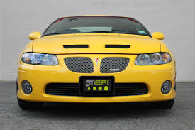 Image result for Yellow 2004 Pontiac