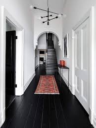 Hallway Decorating Ideas Guaranteed To Make A Lasting First Impression Nonagon Style Black Wood Floors Hallway Decorating House Design