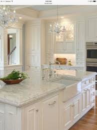 Love The Counter Tops And The White Island And Cabinets Chandalier Is So Pretty To Antique White Kitchen Antique White Kitchen Cabinets White Kitchen Design
