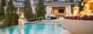 Gunite refers to a concrete pumping process where dry mixed concrete is pumped through lines and mixed with water at a spray nozzle. Landscape Design Inground Pools Construction Charlotte Nc