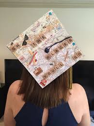 Just buy sparkly scrapbook paper and. How To Make An Interesting Art Piece Using Tree Branches Ehow Graduation Cap Graduation Cap Decoration Graduation Cap Designs
