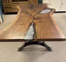 These beautiful solid top and extension tables are available in rectangular, round, square & oval shapes. Walnut Live Edge Dining Table