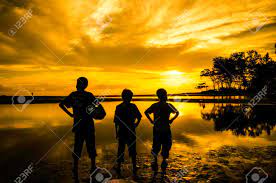 Photo keywords · boy, · alone, · sad, · child, · lonely, · people, · crying, · cry, . Three Boys Standing Toward Sun During Sunrise Sunset One Boy Holding A Ball Cloud Tree Reflection On Water Stock Photo Picture And Royalty Free Image Image 43158480