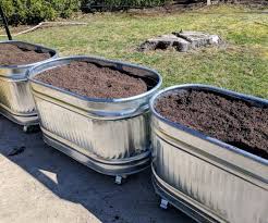 Our garden would be half water trough planters, half straw this would also be a huge waste of money, as vegetable roots don't go down two feet. How I Made Galvanized Trough Planters 13 Steps With Pictures Instructables