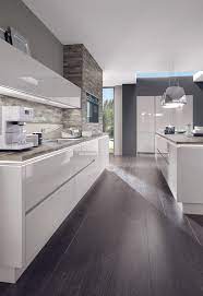 As you make this critical decision, consider the following pros and cons of white kitchen cabinets: Shop This Look Beautiful White High Gloss Kitchen Look Http Na Rehau Com Redirect Brilliant Modern Kitchen Kitchen Design Modern Kitchen Design