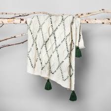 The optimal quality green blanket throw available here are made using the finest fabrics to ensure that you stay warm but not at the cost of skin rashes or other irritations such as wool unraveling. Hearth And Hand Cream Green Woven Tassel Throw Blanket