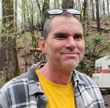 What are the best materials to replace walls in a camper?