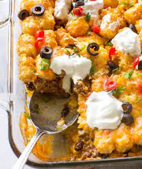 In a large skillet, sauté the garlic, onion, and bell pepper in bacon grease (or olive oil) for 3 to 5 minutes.; Recipes Galore Taco Tater Tot Casserole Serves 8 Facebook