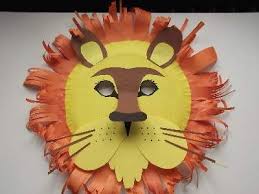 a home made paper plate lion mask with features like the