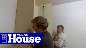 Use adjustable hanging rods to double the storage space and keep related items close together. How To Build Walk In Closet Storage This Old House Youtube