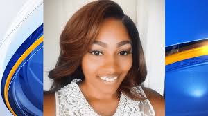 Auburn woman turns herself in and charged in husband's shooting