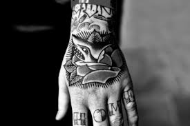 The usage of a monochrome palette in the black and grey rose tattoos by evgeniy goryachiy is like catching the one particular split of a second, freezing the beauty of flowers. Black And White Flower Rose And Hand Image 595641 On Favim Com