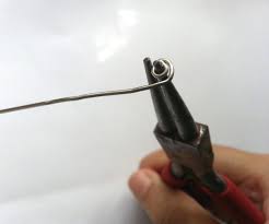 Open the hinge of your clicker ring and insert the opened ring into the hole. Diy Paperclip Ring 4 Steps With Pictures Instructables