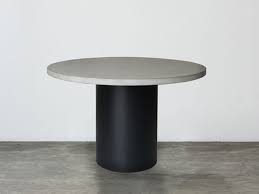 Wooden chairs with simple design will complete this table. Slabs By Design Cooper Round Concrete Dining Table By Slabs By Design Handkrafted
