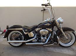 With distinctive 103 badging, chrome rocker covers, air filter cover, and machined cooling fin. Harley Davidson 2009 Heritage Softail Classic Softail Harley Davidson Harley