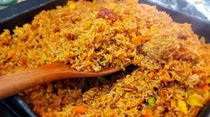 There is no need to stir your meal yet, so periodically taste it to be sure everything is going like planned. Quick Ghana Jollof Rice Stellazone Youtube Jollof Rice Recipes Cooking Meat