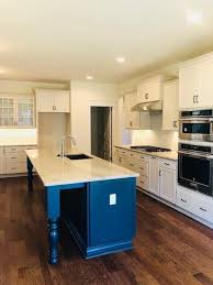 White Macaubus Granite Navy Blue Island Off White Kitchen Cabinets Off White Kitchens Off White Kitchen Cabinets White Kitchen Cabinets