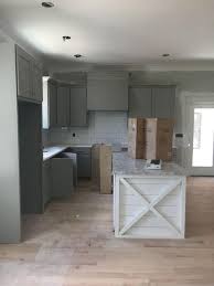 Grey kitchen cabinets with glass doors. 61 Amazingly Farmhouse Gray Kitchen Cabinets Design Ideas Grey Kitchen Cabinets Kitchen Cabinets Decor Grey Kitchen Walls